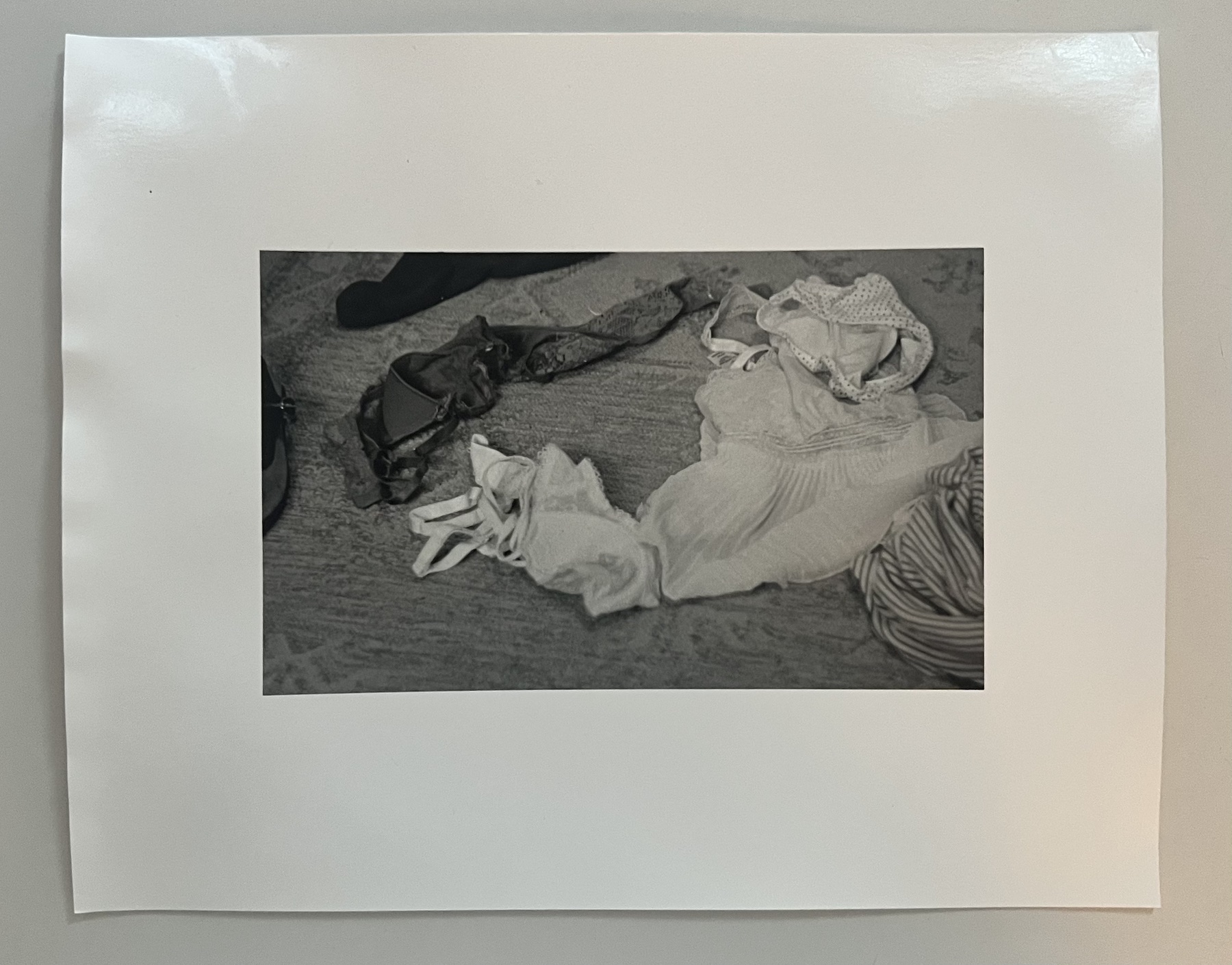 Monochrome photograph of a reclining figure