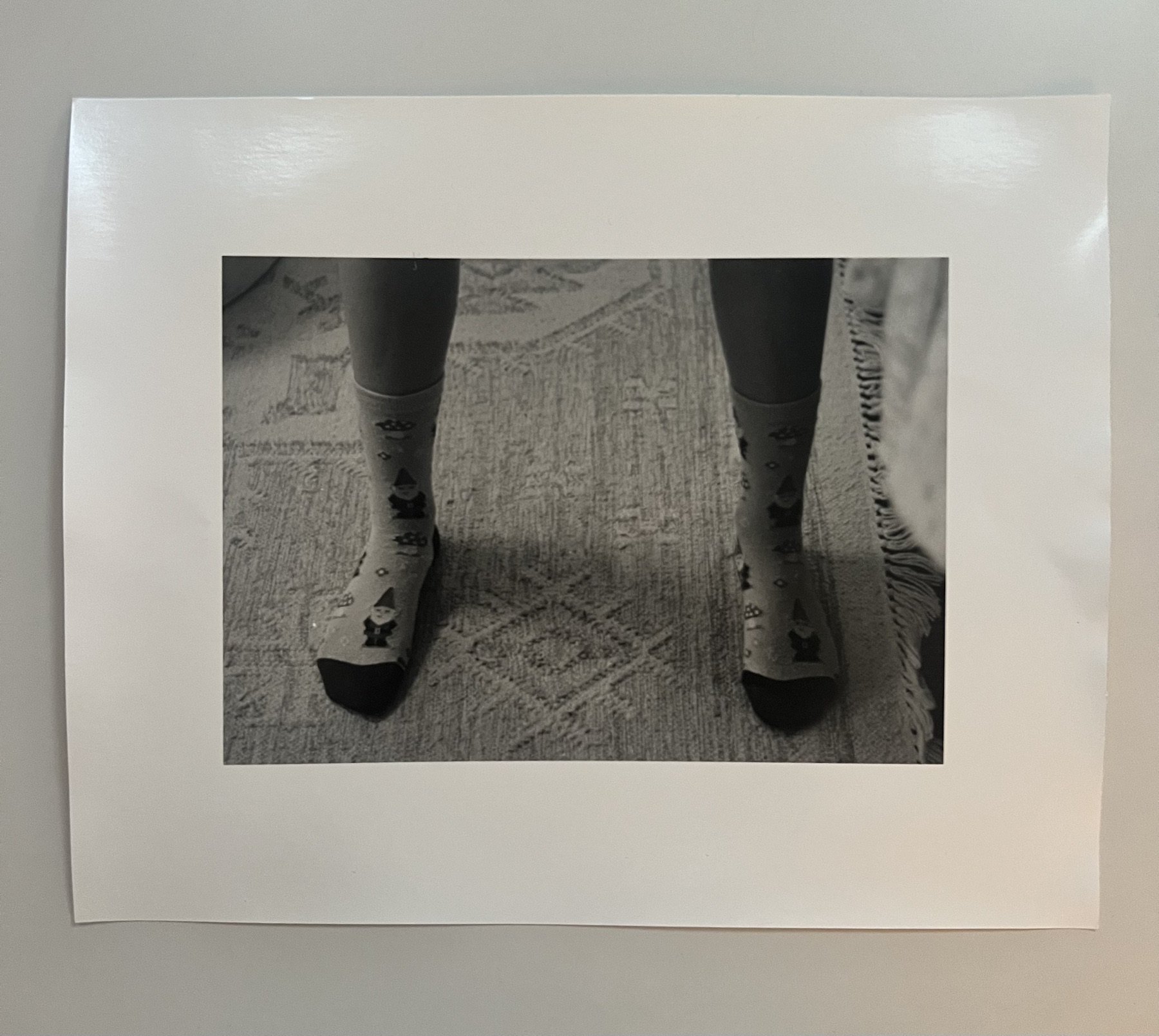 Monochrome photograph of patterned socks